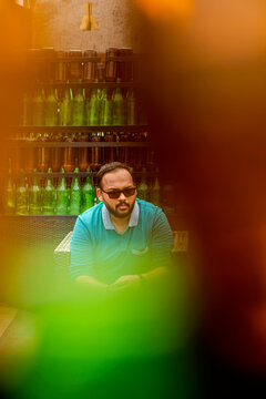 Middle age beard Indian Man posing for the camera