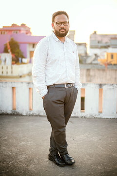 Middle age beard Indian Man posing for the camera