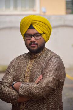 Middle age beard Indian Man posing for the camera