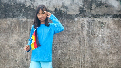 a little girl with a german flag