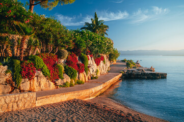 Beautiful Summer Vacation Photo. Summer Time in Croatia. Morning photo, warm soft orange morning light. Edit space © kovop58