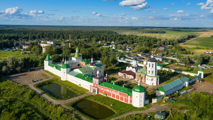 Aerial view over the Nicholas Peshnoshsky Monastery on a summer evening at sunset