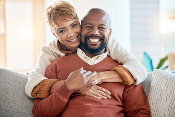 Happy, love and portrait of black couple on sofa for relax, retirement or support together. Smile, hug or marriage with old man and woman in living room at home for bonding, relationship or lifestyle