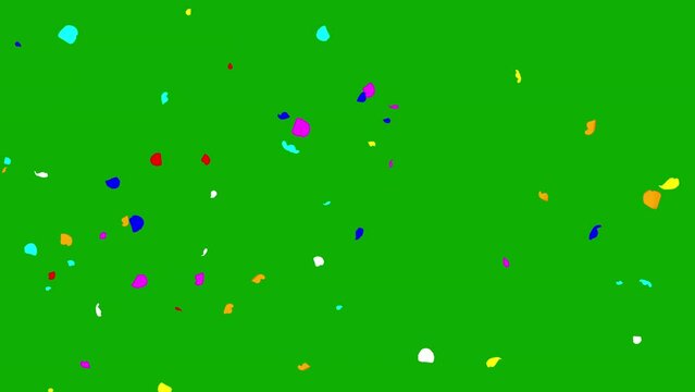 Blowing colorful confetti particles motion graphics with green screen background
