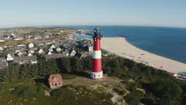 Lighthouse H&ouml;rnum, Sylt, Germany. Schleswig-Holstein, North Sea. 4K drone. Beautiful tourist destination and attraction from above.