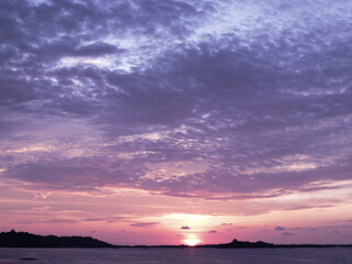 Naklejka na ściany i meble sunset on cempae pare-pare beach, south sulawesi 