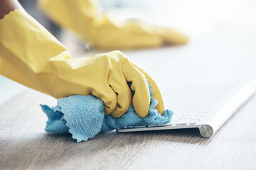 Cleaning service, keyboard computer and hands with cloth for office policy, compliance and covid...