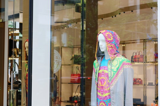 TOKYO, JAPAN - June 28, 2019: A mannequin in the window of a branch of Versace in Ginza. 
