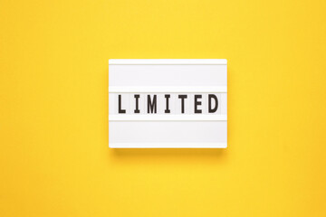 Lightbox with word limited on yellow background - obrazy, fototapety, plakaty