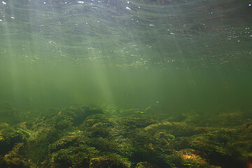 sun rays under water landscape, seascape fresh water river diving