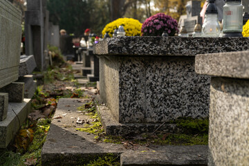 Cemetery or necropolis. Grave tombs on burial ground, gravesite or graveyard.