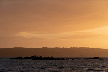 Lovely landscape image of St Michael's Mount in Cornwall England during soft pastel color sunset evening