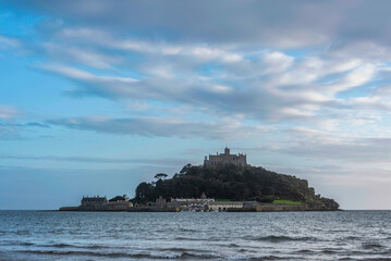 Lovely landscape image of St Michael's Mount in Cornwall England during soft pastel color sunset evening