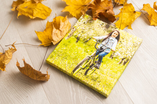 dry autumn leaves and photo canvas