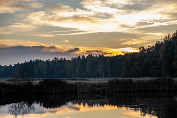 Fototapeta premium sunrise over the lake