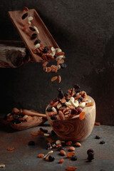 Falling dish with nuts and raisins.
