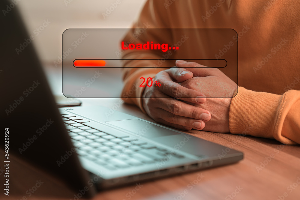 Poster Man using laptop for download software and waiting to loading digital business data form website, concept of waiting for load of loading bar.
