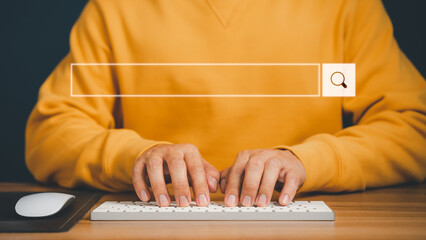 Freelancer's hand using a computer keyboard to search for information, job search. Business ideas...