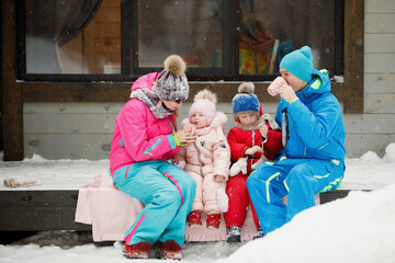 Family on the porch in winter