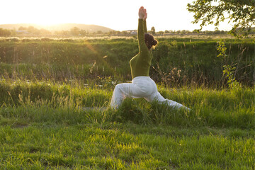 yoga in a field