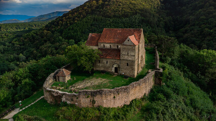 Fototapeta na wymiar Medieval castle on the mountain, drone photography, Romania, Transylvania, Cisnadioara