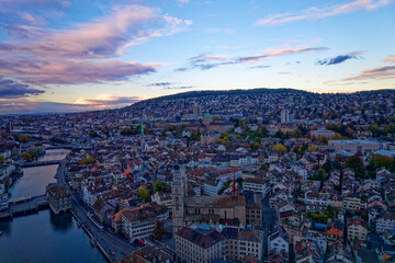 Fototapeta premium Aerial view of City of Zürich with the old town and Limmat River on a cloudy autumn day. Photo taken November 4th, 2022, Zurich, Switzerland.