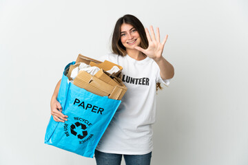 Young woman holding a recycling bag full of paper to recycle isolated on white background counting five with fingers