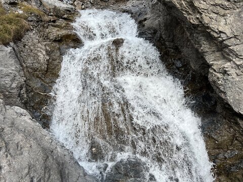 Aua dil Mer Waterfalls or Aua dil Mer Wasserfall (Wasserf&auml;lle Aua da Fluaz oder Panixer Fall) over the lake Panixersee (Lag da Pigniu), Pigniu-Panix - Canton of Grisons, Switzerland (Kanton Graub&uuml;nden