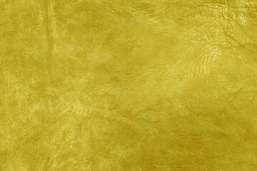 Fototapeta na wymiar Beautiful golden background with leather texture