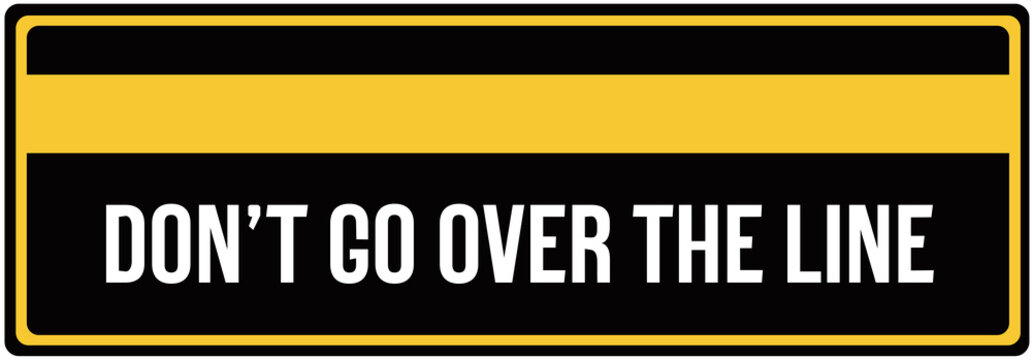 A Sign That Says : Don't Go Over The Line. No Over Line Or Do Not Cross The Yellow Line.