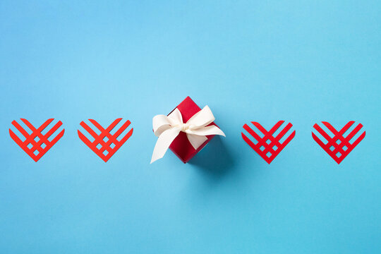 Giving Tuesday, Global Day of Charitable Giving after Black Friday shopping day concept on blue background.