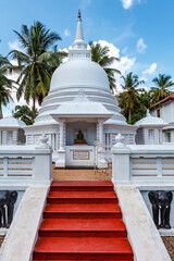 Exterior of a white Buddhist pagoda in Negombo, Sri Lanka, Asia