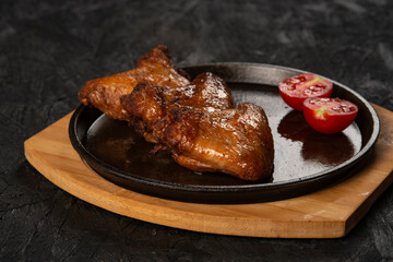 close-up view of delicious grilled chicken with spices