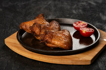 close-up view of delicious grilled chicken with spices