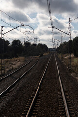 Fototapeta na wymiar Rail tracks from the back wagon of the train of Felipe II 