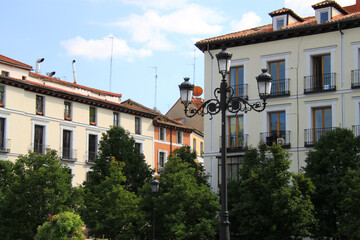 Exterior view of colorful historical buildings in Central Madrid, Spain, Europe. Traditional...