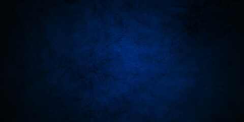 Dark black and blue stone concrete grunge wall texture and backdrop background anthracite panorama. Panorama dark black or blue slate background or texture.	
