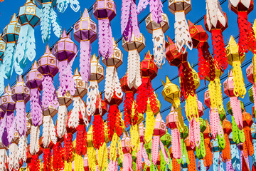 The ordinary style of colorful paper or textile lanterns hanging at the temple during Thailand...