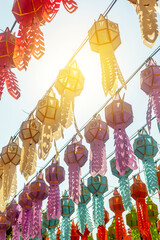 The ordinary style of colorful paper or textile lanterns hanging at the temple during Thailand festival called Loy Kratong at full moon night of November , normal design can be seen everywhere. 