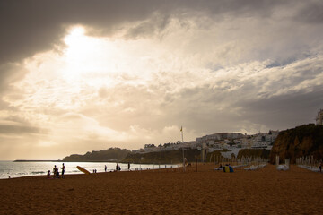 End of the day on the beautiful beach of Albufeira, in the south of Portugal