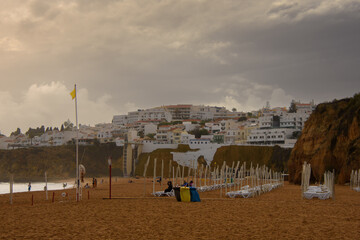 End of the day on the beautiful beach of Albufeira, in the south of Portugal