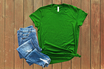 Green shirt mockup Blank Shirt Template Photo with Fall accessories and wooden background shirts...
