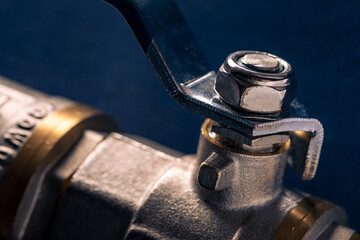 Brass water ball valve of large diameter close-up. Plumbing fittings.