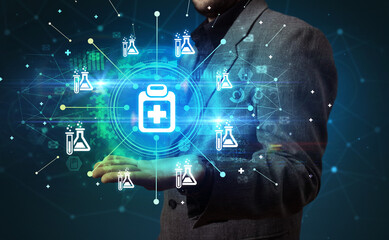 Hand holding healthcare icons concept