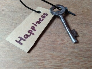 Concept image of happiness on a wooden background