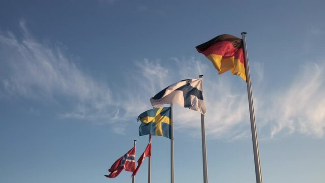Flags of Germany and the the nordic countries Sweden, Finland, Denmark and Norway in the wind