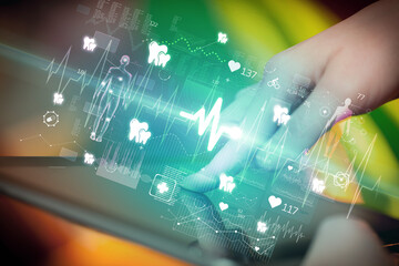 Close-up of a touchscreen with healthcare icons