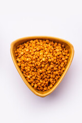 Fried and Spicy Chana Dal Masala namkeen is a popular Chakna recipe. served in a bowl