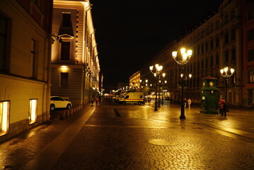 Beautiful night street with lighting in St. Petersburg. Saint Petersburg, Russia - August 20, 2022: