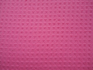 Sponge fibers sponge texture pattern surface close-up pink magenta background